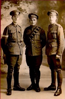 3 soldiers in WWI dress on leave in Paris