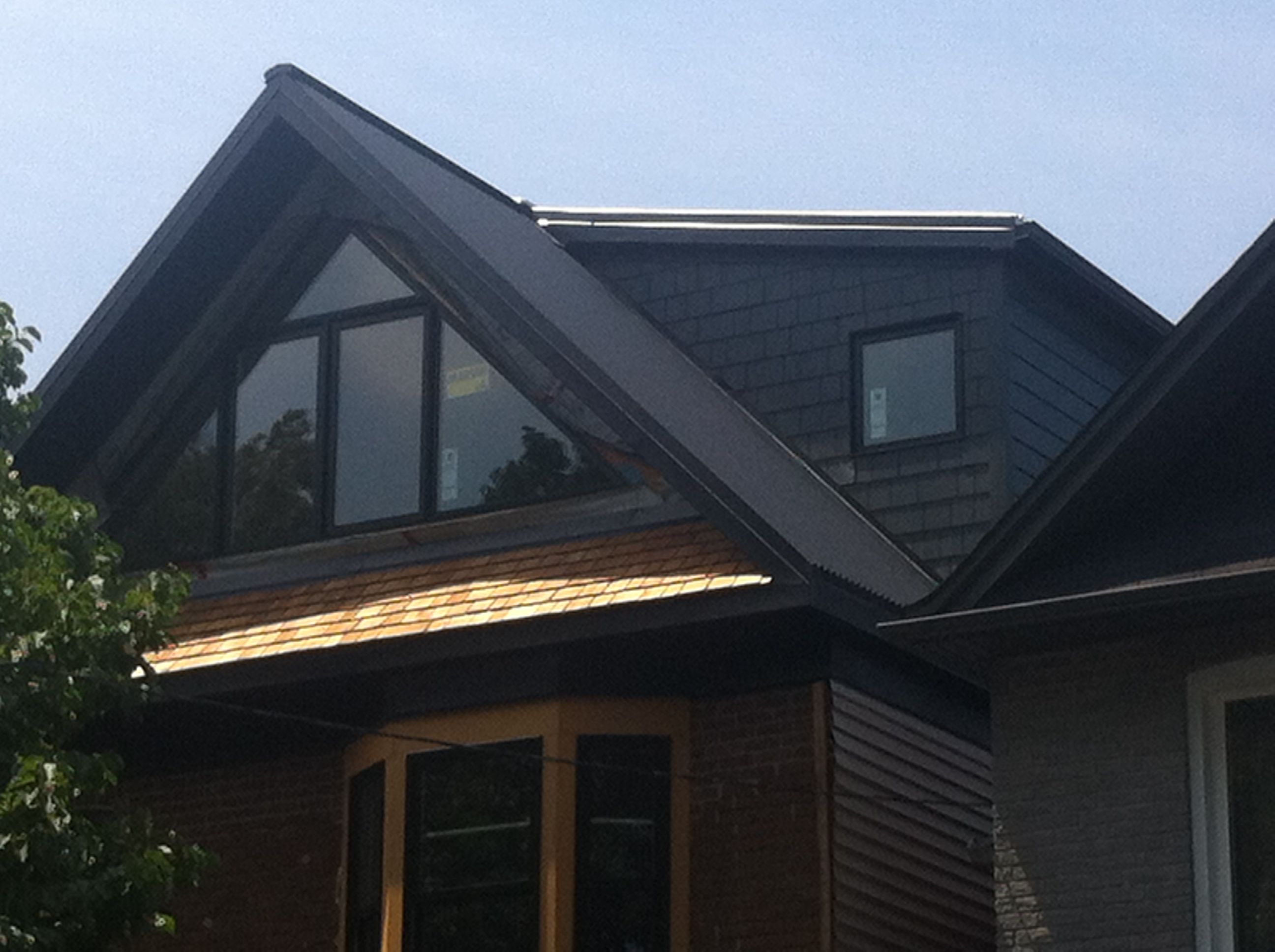 The roof from the street, with Hardie board siding