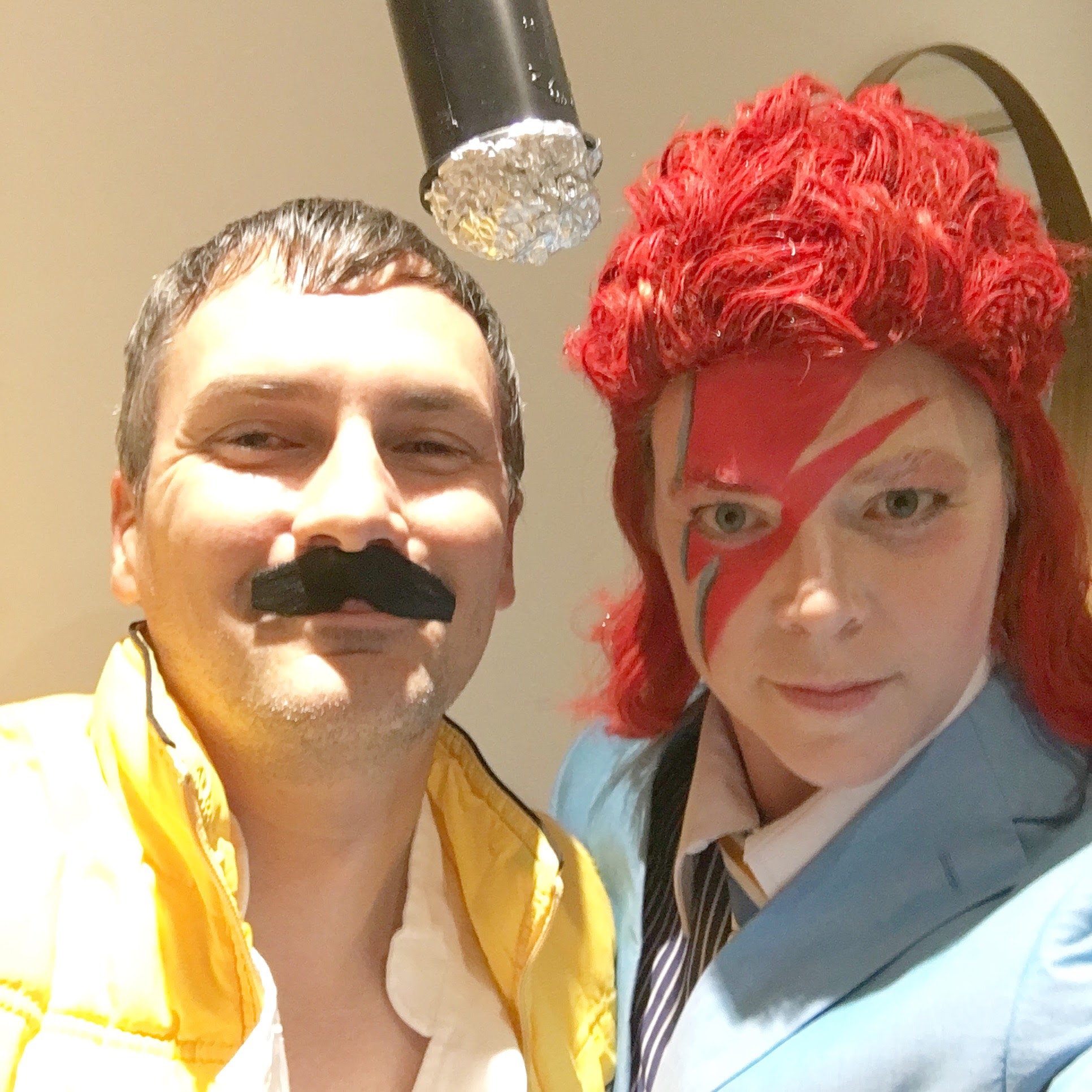 Couple dressed as Freddy Mercury and David Bowie