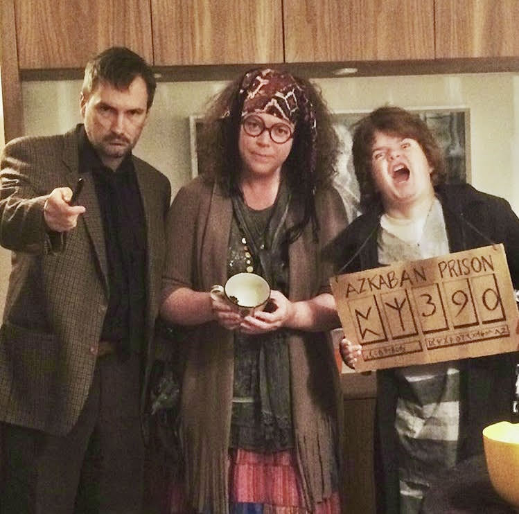 Family dressed as Remus, Trelawney, and Black