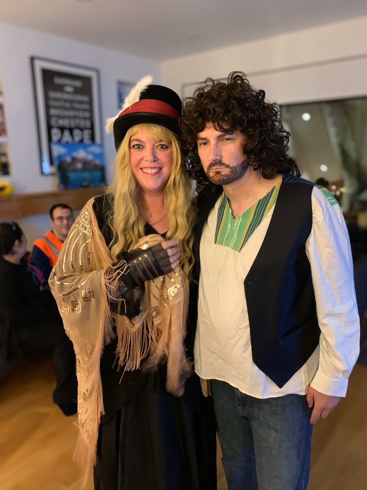 Couple dressed as Stevie Nicks and Lindsey Buckingham
